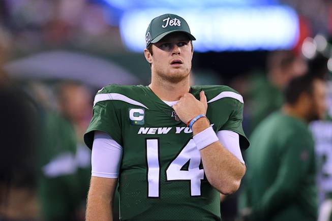 New York Jets quarterback Sam Darnold (14) walks the sideline during the second half of an NFL football game against the New England Patriots, Monday, Oct. 21, 2019, in East Rutherford, N.J. 