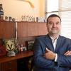 Matthew Holt is founder of Las Vegas-based U.S. Integrity, poses for a portrait in his office, Thursday, Oct. 24, 2019. U.S. Integrity, which counts sportbooks and college athletic conferences among its clients, monitors social media, tracks the records of referees and examines the movement of betting lines, among other data, to identify trends that could indicate something amiss.