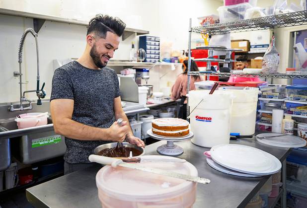 Owner Ricardo Gudino mixes cake batter in the kitchen at Caked Las Vegas, 7175 W. Lake Mead Blvd., Tuesday, Oct. 29, 2019. Originally The Cupcakery, Gudino changed the name of the bakery to promote his custom-made cakes, including wedding cakes.