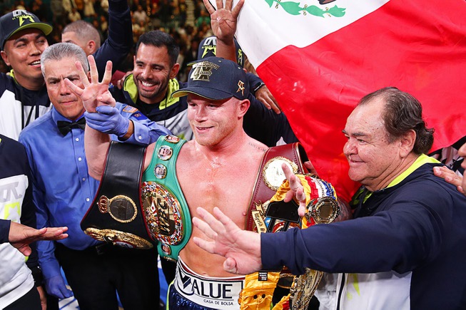 Canelo Alvarez poses for photos after defeating Sergey Kovalev in ...