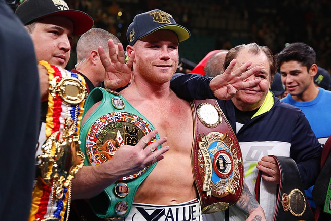 Canelo Alvarez poses for photos after defeating Sergey Kovalev by ...