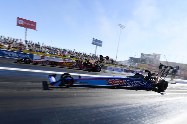 Eventual winner Brittany Force takes on Pat Dakin during the ...