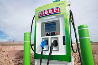 The Nevada Governor's Office of Energy celebrated the grand opening of the first electric vehicle charging station on the I-15 at Terrible's Road House in Jean NV, Thursday Nov. 14, 2019.