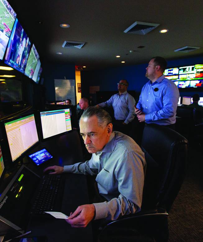 Employees work in the trading room at the SuperBook at the Westgate on Saturday, Nov. 16, 2019. 