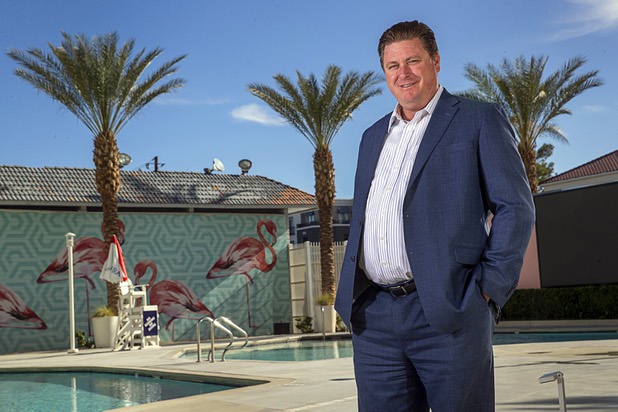 Tim Kuykendall, general manager of OYO hotel-casino, formerly Hooters, poses by the pool at the casino Tuesday, Nov. 26, 2019. 