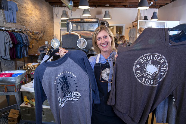 Tara Leon-Bertoli poses with Boulder City-themed clothing at the Boulder City Company Store in Boulder City Wednesday, Nov. 27, 2019. Tara co-owns the business with her husband Dr. Troy Bertoli. 