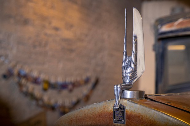 A winged figure, like those at Hoover Dam, adorns a 1928 DeSoto sedan at the Boulder City Company Store in Boulder City Wednesday, Nov. 27, 2019. The store sells Boulder City-themed merchandise and clothing. 