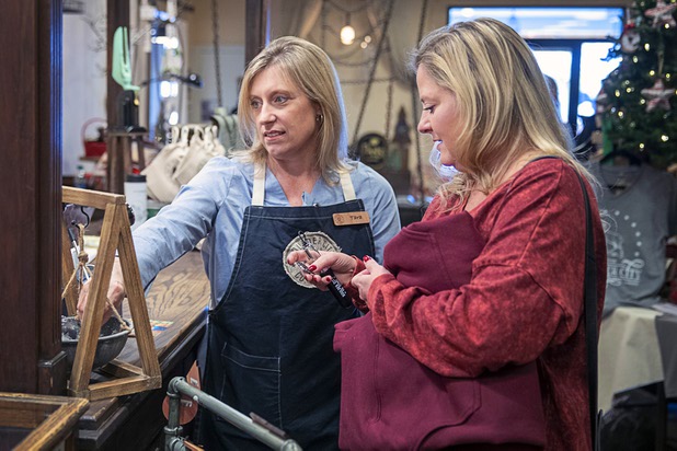 Tara Leon-Bertoli, left, assists Kelly Reinke as she shops at the Boulder City Company Store in Boulder City Wednesday, Nov. 27, 2019. 