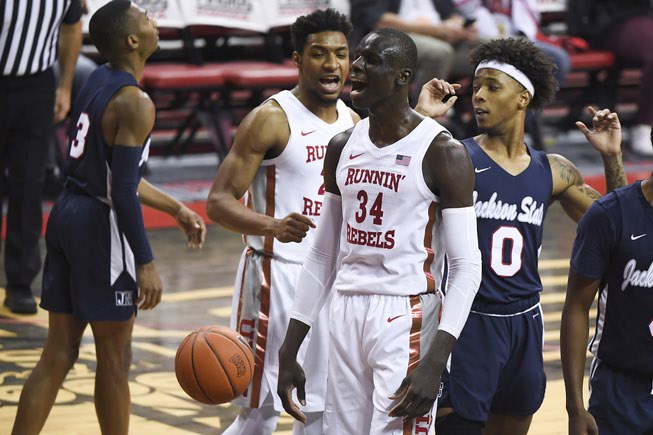 UNLV Rebels forward Cheikh Mbacke Diong (34) reacts after getting ...