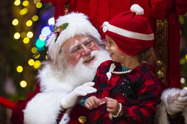 Marcy Manuele Jr., 4, meets Santa during a tree lighting ...