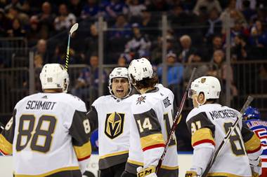 Golden Knights right wing Alex Tuch, second from left, reacts with teammates after scoring his second goal during the first period against the New York Rangers, Monday, Dec. 2, 2019, in New York. 