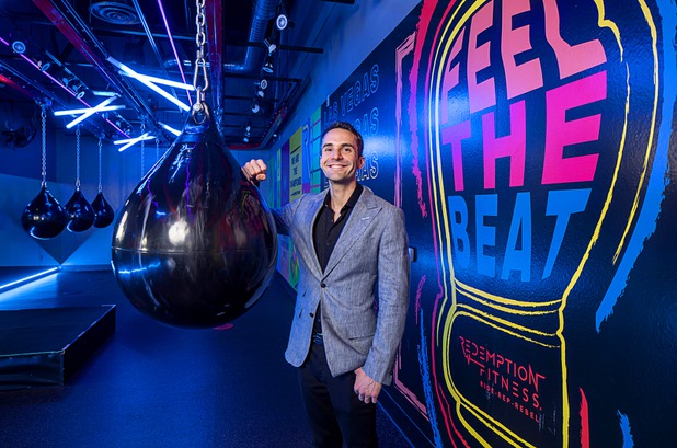 Bryan Ercolano, CEO/founder of Redemption Fitness, poses in the Rebel room at the gym at 1059 S. Rampart Blvd. Wednesday, Dec. 4, 2019.