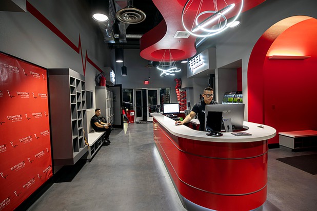 Andrew Nguyen mans the front desk at Redemption Fitness, 1059 S. Rampart Blvd., Wednesday, Dec. 4, 2019.