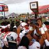 Liberty players celebrate their 50-7 victory over Centennial in the 4A high school football championship at Sam Boyd Stadium Saturday, Dec. 7, 2019.