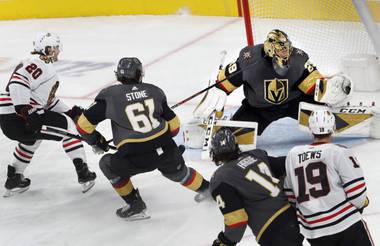 Vegas Golden Knights goaltender Marc-Andre Fleury makes a glove save in the first period during a game against the Chicago Blackhawks at T-Mobile Arena Tuesday, Dec. 10, 2019. 