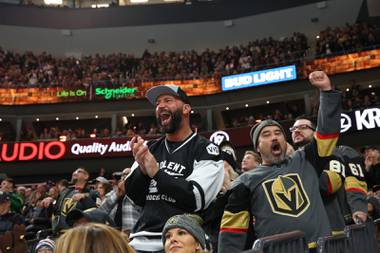 Fans cheer as the Golden Knights score against the Avalanche during the second period their game at the T-Mobile Arena, Monday Dec. 23, 2019.