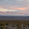 Photo: Snow covers the south McCullough Mountains as vehi