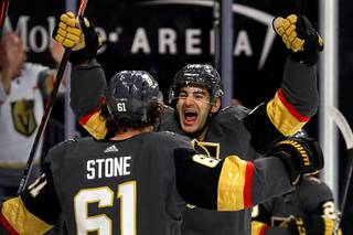 Vegas Golden Knights left wing Max Pacioretty, right, celebrates with right wing Mark Stone (61) after scoring in the first period against the Philadelphia Flyers at T-Mobile Arena, Thursday, Jan. 2, 2020.