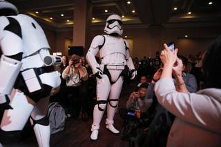 Star Wars stormtroopers walk through the audience during a Panasonic news conference before the CES tech show, Monday, Jan. 6, 2020, in Las Vegas. (AP Photo/John Locher)