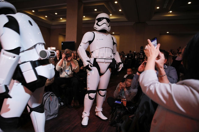 Star Wars stormtroopers walk through the audience during a Panasonic ...