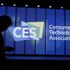 A person walks past a sign at a Samsung keynote before the CES tech show, Monday, Jan. 6, 2020, in Las Vegas. (AP Photo/John Locher)