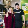 Donna Curry and Darick Wallin pose at one of Curry's Subway sandwich shops, where Wallin is employed.