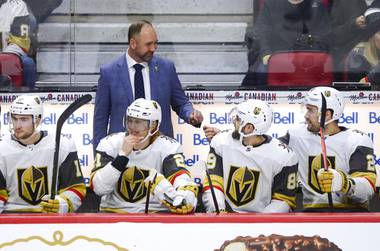 Golden Knights new head coach Peter DeBoer is seen on the bench as they take on the Ottawa Senators during the first period of an NHL hockey game, Thursday, Jan. 16, 2020 in Ottawa, Ontario. 