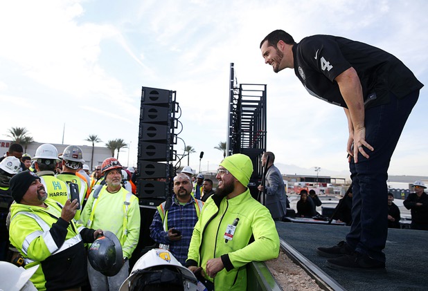 Las Vegas Raiders quarterback Derek Carr (4) poses for a photo during a news conference, officially renaming the Oakland Raiders to the Las Vegas Raiders, in front of Allegiant Stadium in Las Vegas Wednesday, Jan. 22, 2020.