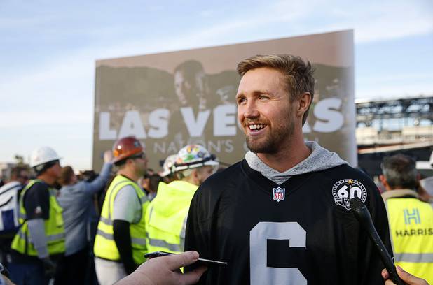 Las Vegas Raiders punter A.J. Cole talks with reporters during a news conference, officially renaming the Oakland Raiders to the Las Vegas Raiders, in front of Allegiant Stadium in Las Vegas Wednesday, Jan. 22, 2020.