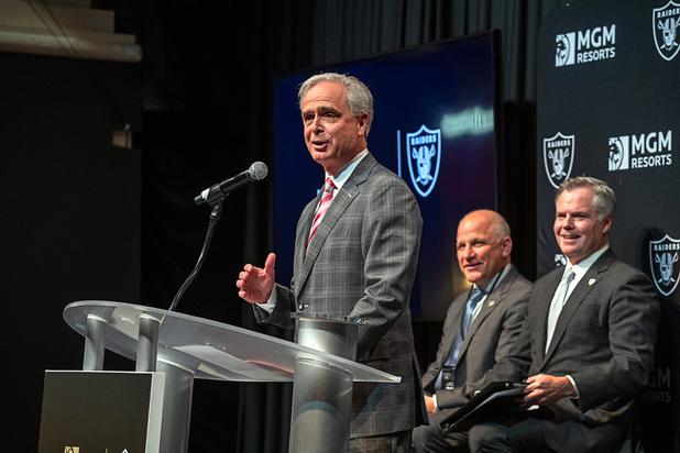 Chuck Bowling, president and COO of Mandalay Bay, speaks during a news conference at Mandalay Bay Thursday, Jan. 23, 2020. MGM Resorts International announced a founding partnership with the Las Vegas Raiders. Behind Bowling are Marc Badain, center, president of the Las Vegas Raiders, and Jim Murren, chairman and CEO of MGM Resorts International,
