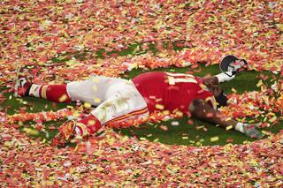 Kansas City Chiefs' Derrick Nnadi (91) plays with the confetti, at the end of the NFL Super Bowl 54 football game against the San Francisco 49ers, Sunday, Feb. 2, 2020, in Miami Gardens, Fla. The Chiefs' defeated the 49ers 31-20. 

