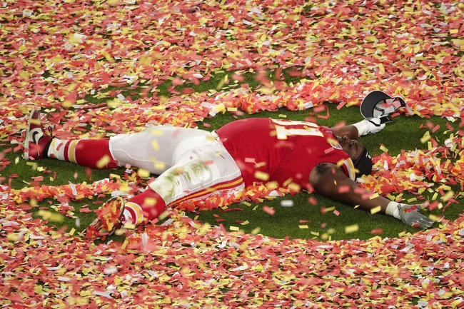 Kansas City Chiefs' Derrick Nnadi (91) plays with the confetti, at the end of the NFL Super Bowl 54 football game against the San Francisco 49ers, Sunday, Feb. 2, 2020, in Miami Gardens, Fla. The Chiefs' defeated the 49ers 31-20. 

