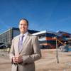 Scott Muelrath, CEO of the Henderson Chamber of Commerce, stands in front of the Las Vegas Raiders practice facility Jan. 23 in Henderson.