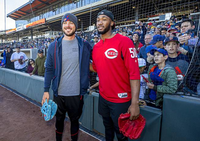 Kris Bryant, left, third baseman and outfielder for the Chicago ...