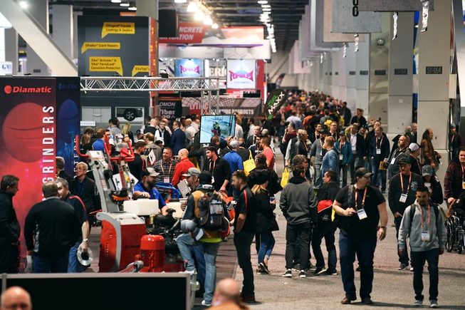 Attendees mill about during the World of Concrete show Tuesday, ...