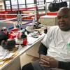 In this Jan. 31, 2020, photo, James "Buster" Douglas, the former world heavyweight champion, sits at the Thompson Community Center in Columbus, Ohio, where he teaches youth boxing. In one of the more spectacular upsets in sports history, Douglas defeated Mike Tyson, the reigning world heavyweight champion on Feb. 11, 1990, in Tokyo.