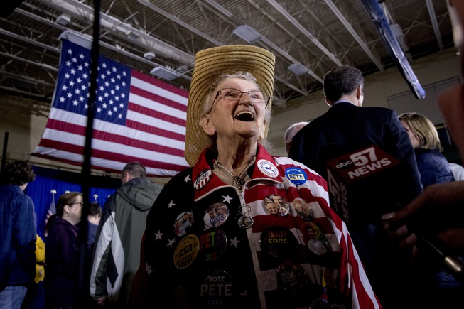 New Hampshire Primary - Campaign buttons cover the jacket of Pat ...