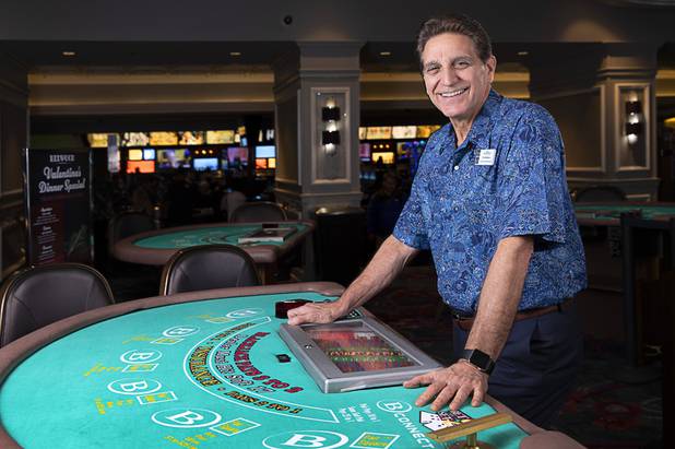 Pat Ballaro, casino shift manager, poses in a table games area at the California in downtown Las Vegas Friday, Feb. 14, 2020. Ballaro started with Boyd Gaming in 1979. 