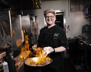Chef Jaimee Pepe gets fired up in the Twin Creeks Steakhouse.