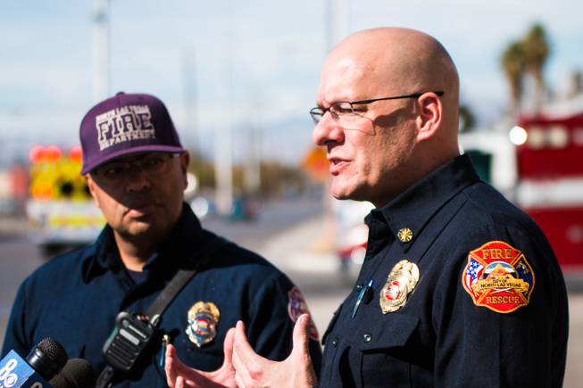 North Las Vegas Fire Department spokesman Nino Galloway (left) and Fire Chief Joseph Calhoun brief reporters Saturday Feb. 15, 2020, on a fire sparked by a space heater, which killed a 74-year-old in a mobile home at 3209 Orr Avenue. 
