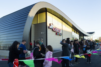 Attendees wait in line for free tacos and sandwiches from Roberto's Taco Shop and Capriotti's during the grand opening of the Swoop building, which houses the restaurants, at Huntridge Center Thursday, Feb. 20, 2020. (Yasmina Chavez / Las Vegas Sun)