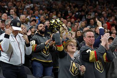 Fans cheer a goal by Vegas Golden Knights left wing Max Pacioretty during the first period of an NHL hockey game against the Edmonton Oilers at T-Mobile Arena in Las Vegas Wednesday, Feb. 26, 2020.