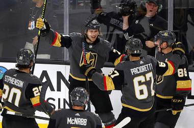 Vegas Golden Knights center William Karlsson, center, celebrates with teammates after scoring during the third period of an NHL hockey game against the Buffalo Sabres at T-Mobile Arena in Las Vegas Friday, Feb. 28, 2020.