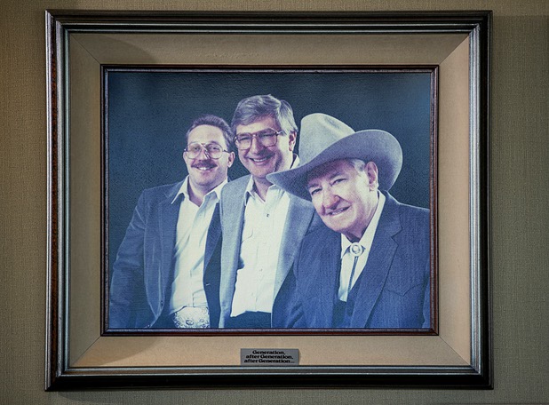 A 1980's photo displayed in Bill Boyd's office shows Bill Boyd, center, his father Sam Boyd, right, and his son Sam J. Boyd.