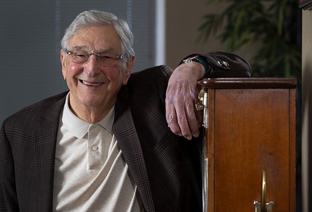 Bill Boyd, executive chairman and co-founder of Boyd Gaming, poses by a vintage gambling machine in his office Tuesday, March 3, 2020.