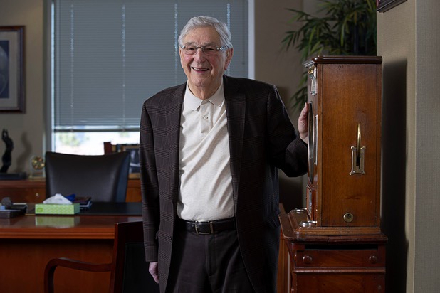 Bill Boyd, executive chairman and co-founder of Boyd Gaming, poses by a vintage gambling machine in his office Tuesday, March 3, 2020.