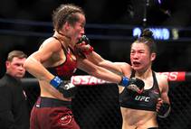 Zhang Retains Title With Split Decision