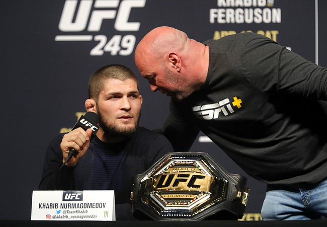 UFC lightweight champion Khabib Nurmagomedov listens to UFC Dana White during a news conference for UFC 249 at T-Mobile Arena in Las Vegas Friday, March 6, 2020. Nurmagomedov will defend his title against Tony Ferguson, former interim lightweight champion, in UFC 249 on April 18, 2020 at Barclays Center in Brooklyn, New York.