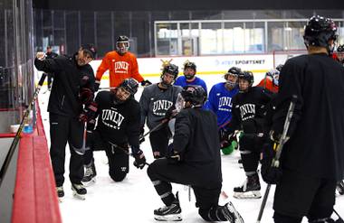 Assistant coach Nick Robone goes over drills with players during UNLV hockey practice at City National Arena in Summerlin Thursday, March 12, 2020.