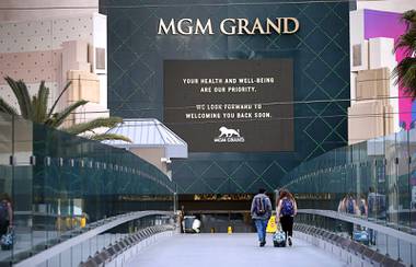 The sign at the MGM Grand displays a message to guests Tuesday, March 17, 2020. MGM Resorts properties temporarily closed at midnight in an effort to stem the spread of the new coronavirus (COVID-19).